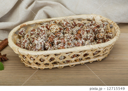 Peanut in honey with sesame seeds 12715549