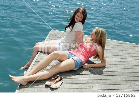 women on the berth at sunny vacation day 12715965