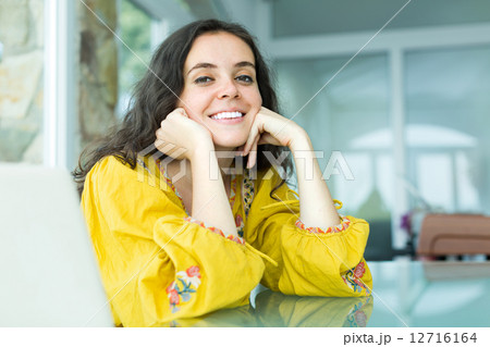 Brunette girl with charming smile 12716164