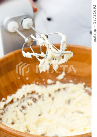 electric mixer with a dough with beaten 12721692