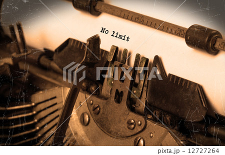 Old typewriter with paper 12727264