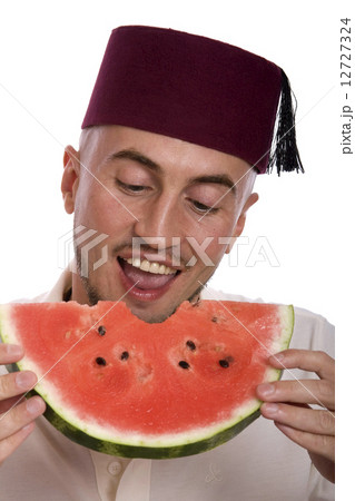 Man with watermelon Man with watermelon 12727324