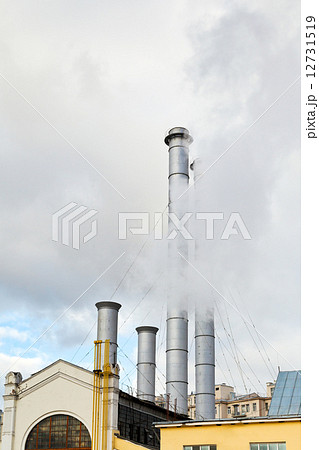smoke from chimneys of district heating station 12731519