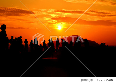 Photographer waiting for sunset Photographer waiting for sunset 12733580