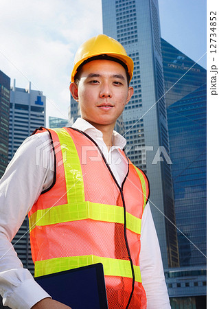 Construction Professionals Collaboration Asian Engineer, Builder and Architect in Urban Singapore Construction Professionals Collaboration Asian Engineer, Builder and Architect in Urban Singapore 12734852