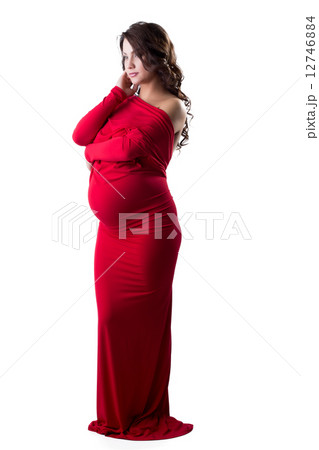 Beautiful expectant mother posing in elegant dress Beautiful expectant mother posing in elegant dress 12746884