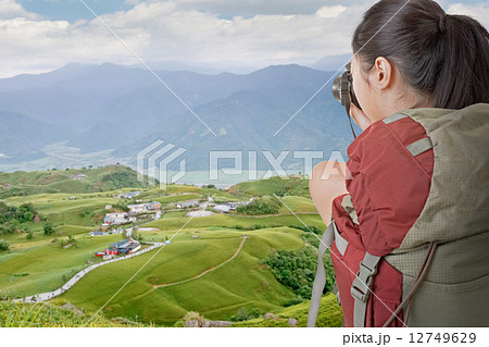backpacker take photo backpacker take photo 12749629