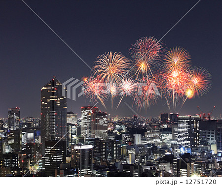 Fireworks celebrating over Tokyo cityscape at night 12751720