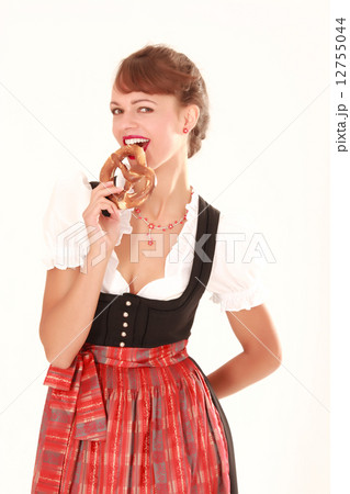 Bavarian woman with pretzel in his hand Bavarian woman with pretzel in his hand 12755044