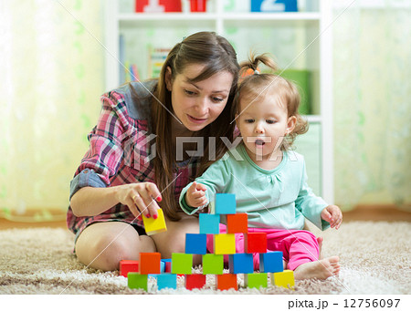 mom with her daughter play together mom with her daughter play together 12756097