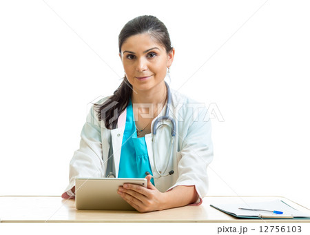 Doctor using a digital tablet isolated on white Doctor using a digital tablet isolated on white 12756103
