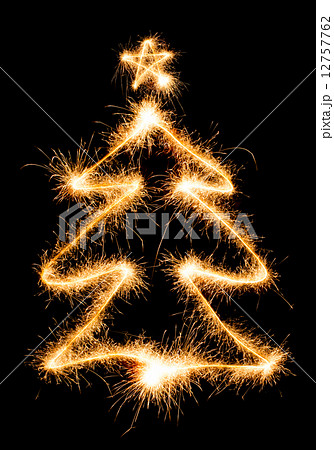 Christmas tree made by sparkler on a black Christmas tree made by sparkler on a black 12757762