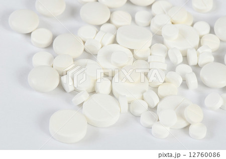 Tablets close up. A medical background 12760086