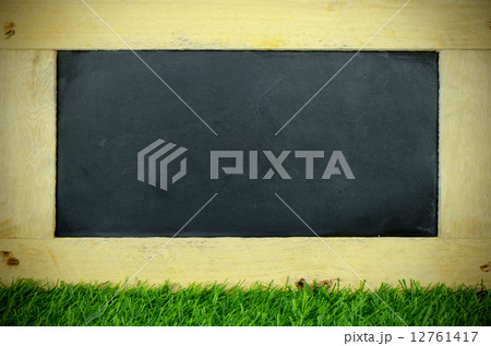 Blank Chalkboard on Lawn. Blank Chalkboard on Lawn. 12761417