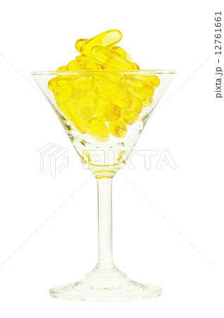 Medicine Capsule in Cocktail Glass isolated with Clipping Path. Medicine Capsule in Cocktail Glass isolated with Clipping Path. 12761661