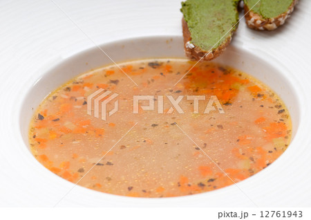 Italian minestrone soup with pesto crostini on side 12761943