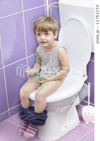 Baby on the Toilet 12763250