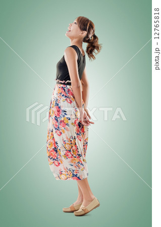 Attractive Asian woman with maxi dresses Attractive Asian woman with maxi dresses 12765818