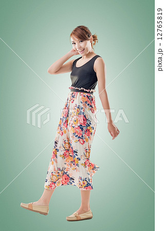 Attractive Asian woman with maxi dresses 12765819