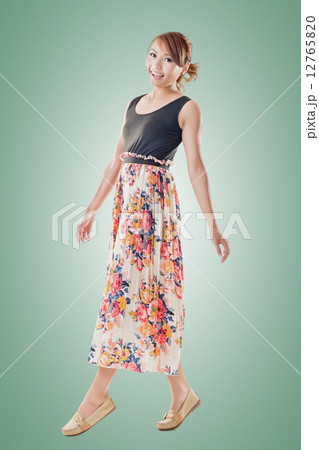 Attractive Asian woman with maxi dresses 12765820