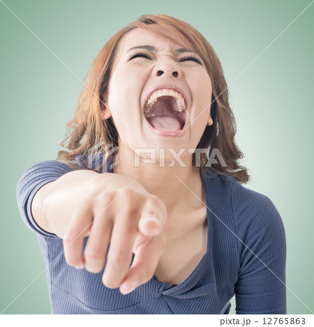 woman pointing and laughing at you 12765863