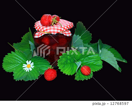 jar with strawberry jam and green leaves jar with strawberry jam and green leaves 12768597