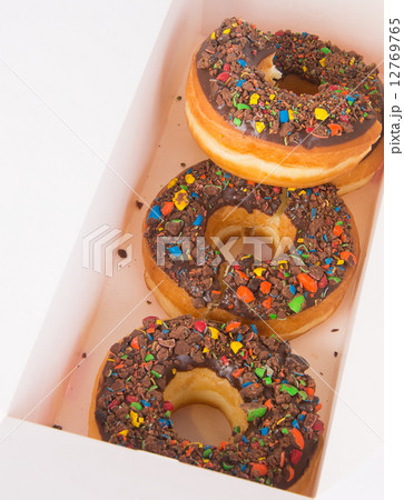 chocolate donuts on a white background chocolate donuts on a white background 12769765