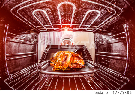 Cooking chicken in the oven. Cooking chicken in the oven. 12775389