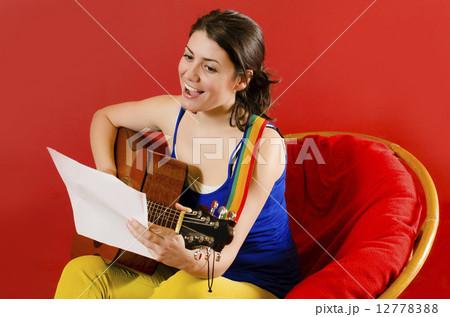 Playing Guitar 12778388