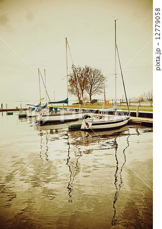 Marina with yachts at sunset, retro vintage effect. 12779058