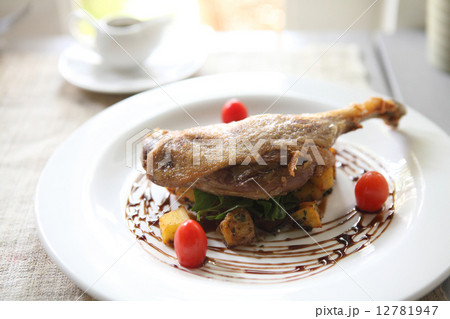 Duck confit , Roasted duck with blueberry sauce 12781947