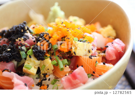 Sushi don , raw salmon tuna octopus on rice Sushi don , raw salmon tuna octopus on rice 12782565