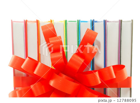 Row of colorful books tied up with ribbon Row of colorful books tied up with ribbon 12788095