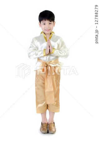 Asian cute boy in thai costume acting Hello in thai on white bac Asian cute boy in thai costume acting Hello in thai on white bac 12788279