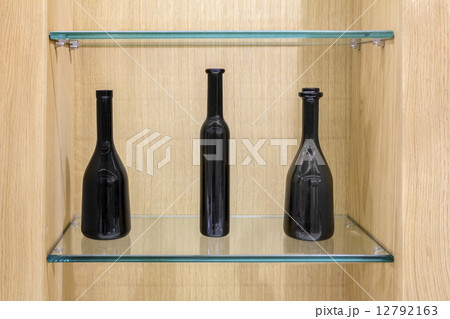 Three Empty black bottles 12792163