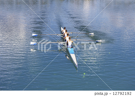 Four men rowing 12792192