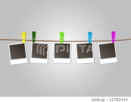 Photo Frames on Rope with colored clothespins.  12792433