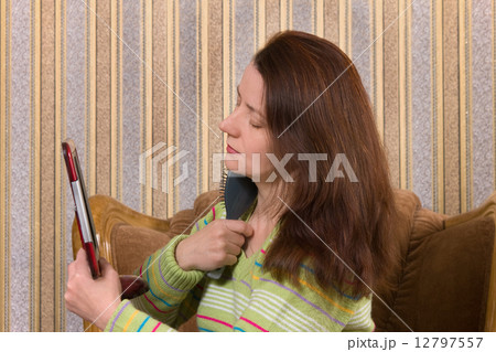 The woman and a mirror 12797557