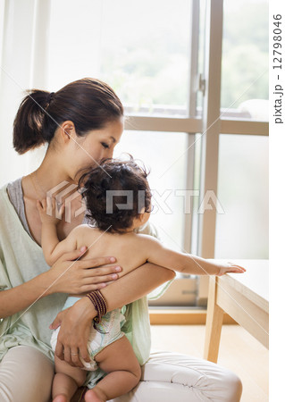 Mother holding her baby boy. 12798046