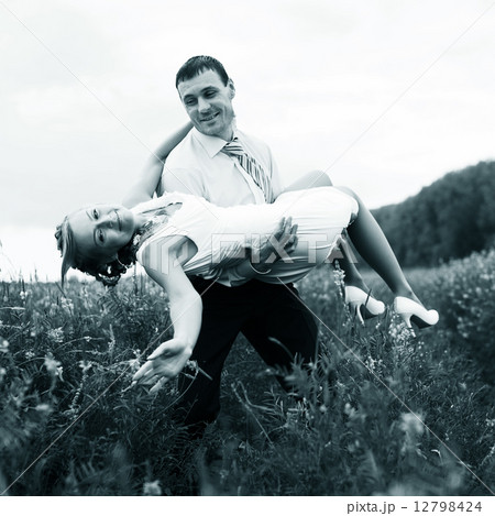 Groom carry a bride Groom carry a bride 12798424