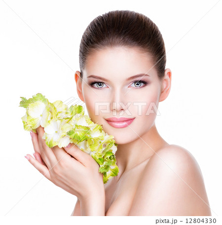 Young beautiful woman with a healthy clean skin. Young beautiful woman with a healthy clean skin. 12804330
