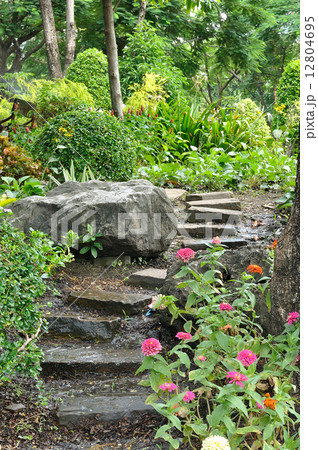 Natural stone stairs landscaping in home garden 12804695