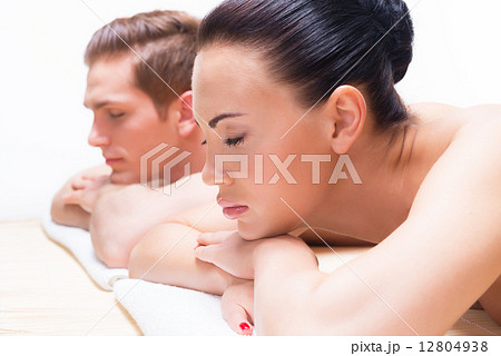 Couple lying on the massage desks. Couple lying on the massage desks. 12804938