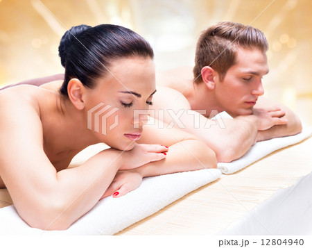 Couple lying on the massage desks. Couple lying on the massage desks. 12804940