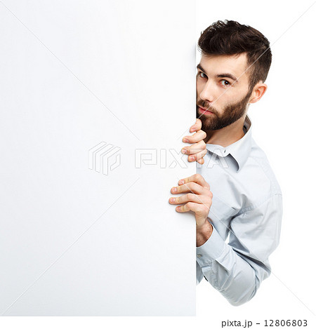 A young bearded man showing blank signboard, isolated over white 12806803