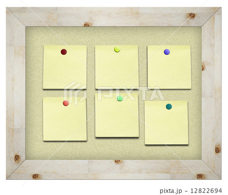 yellow memo sticker on notice cork board isolated on white yellow memo sticker on notice cork board isolated on white 12822694