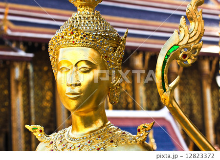 Golden kinnara statue in Grand palace Bangkok,Thailand. Golden kinnara statue in Grand palace Bangkok,Thailand. 12823372