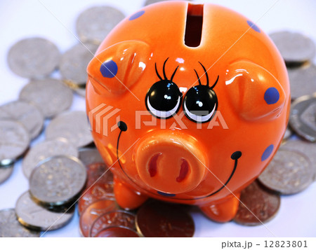 Bunch of coins and piggy bank 12823801