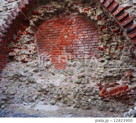 Ancient gate in the stone walls surrounding Riga old town 12823900