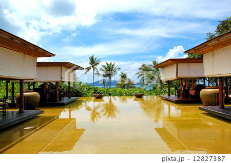 Lounge pool view area at luxury hotel, Phuket, Thailand Lounge pool view area at luxury hotel, Phuket, Thailand 12827387